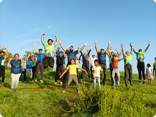 Walkkaro community jumping in celebration